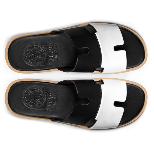 Top view of Dujan black and white leather slippers for men from the Qadam Collection by Cuero by HAC