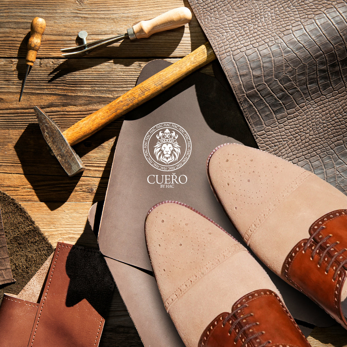 A tan brogue upper being stitched on a sewing machine