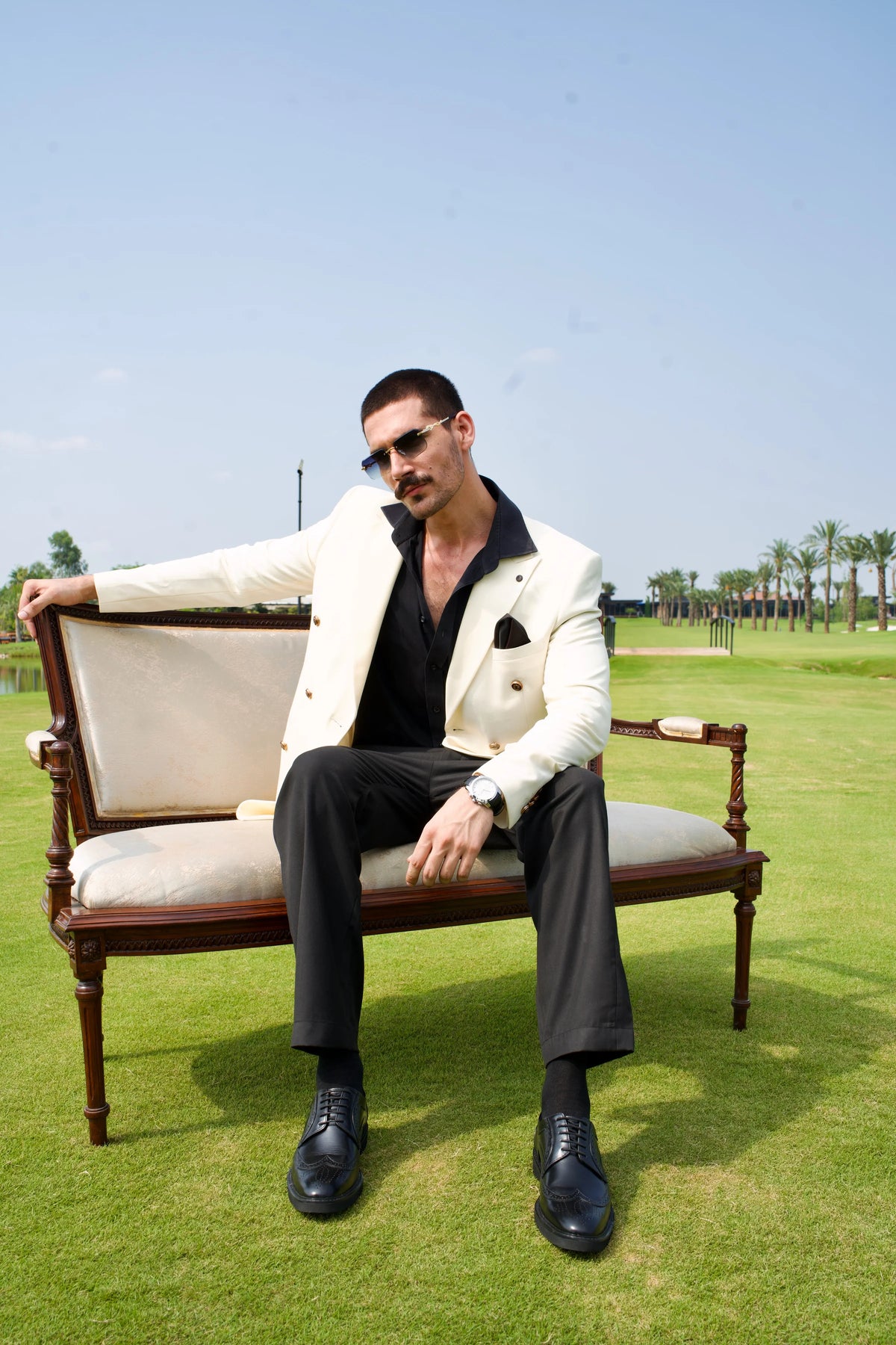 Man in a tailored suit wearing Cuero leather shoes