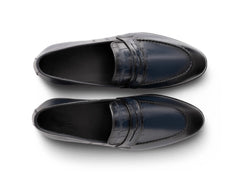Top angled view of Alton blue leather loafers showing stitching detail, smooth leather finish, and refined craftsmanship