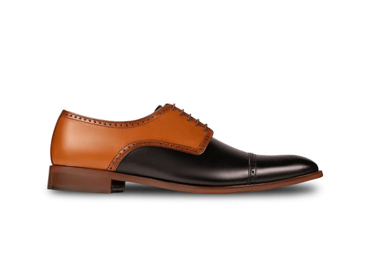 Side profile of Askari two-tone leather brogues highlighting refined silhouette, premium craftsmanship, and contrast leather design