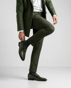Best Carlton olive leather loafers worn with tailored outfit in standing lifestyle shot showcasing modern elegance and luxury menswear style