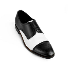 Close-up detail of Bold Brogue shoes highlighting intricate brogue perforation and premium leather craftsmanship