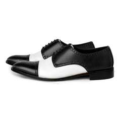 Bold Brogue men’s black and white dress shoes classic brogue style in premium studio hero shot showcasing bold contrast formal design