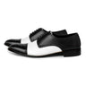 Bold Brogue men’s black and white dress shoes classic brogue style in premium studio hero shot showcasing bold contrast formal design