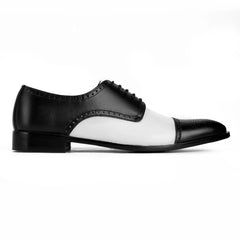 Side profile of Bold Brogue dress shoes showing black and white contrast design with elegant formal silhouette
