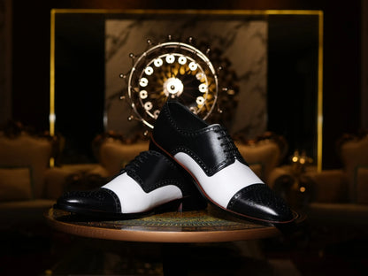 Bold Brogue shoes showing lace structure, brogue perforation, and black and white contrast leather design