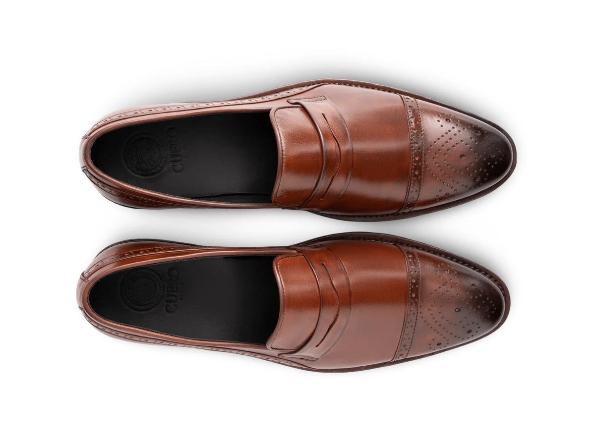 Top view of Carpio brogue leather loafer showing brogue perforation, stitching detail, and premium handcrafted leather finish