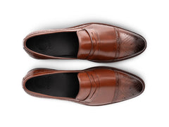 Top view of Carpio brogue leather loafer showing brogue perforation, stitching detail, and premium handcrafted leather finish