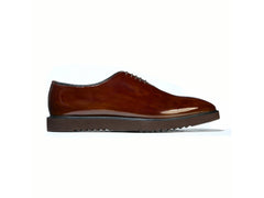 The Beaumont Cueřo Grand Atelier luxury men’s brown formal dress shoes side profile view with glossy leather and sleek formal silhouette