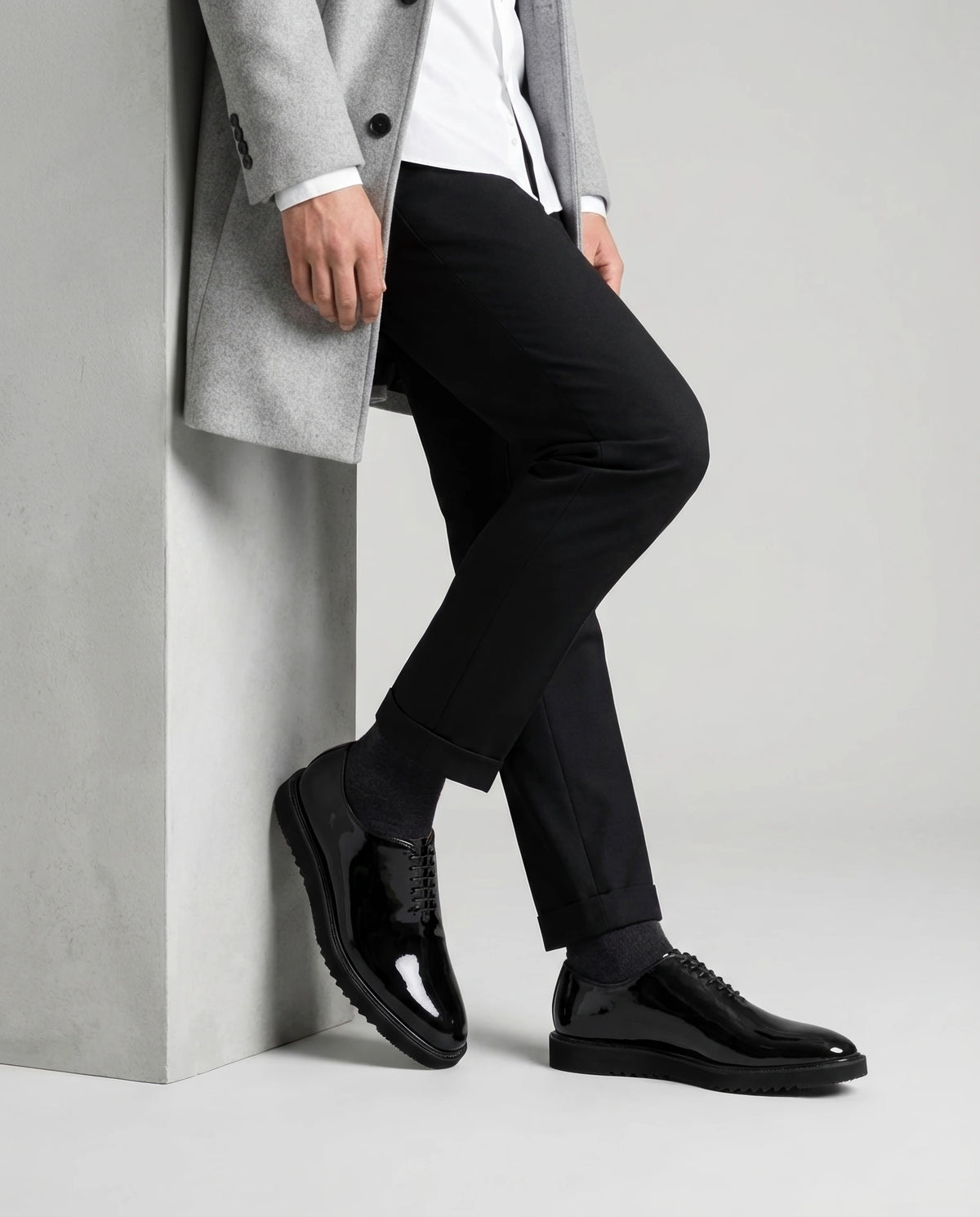 The Vance Cueřo Grand Atelier luxury men’s formal dress shoes styled with tailored suit editorial pose