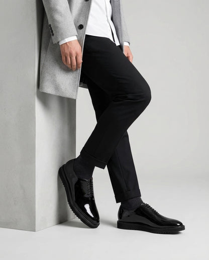 The Vance Cueřo Grand Atelier luxury men’s formal dress shoes styled with tailored suit editorial pose