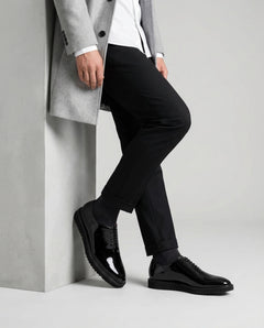 The Vance Cueřo Grand Atelier luxury men’s formal dress shoes styled with tailored suit editorial pose
