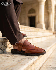 Elegant brown Peshawari sandal styled with eastern traditional wear