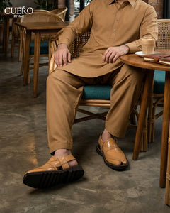 Handcrafted from premium full-grain leather, this luxury Peshawari chappal reflects timeless eastern craftsmanship with a refined modern silhouette. Designed for weddings, festive wear, and elevated everyday styling.