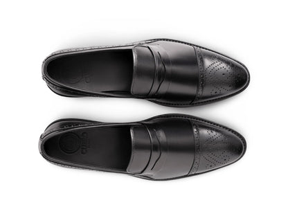 Top angled view of Deyoshi black leather loafers showing smooth leather texture, stitching detail, and premium craftsmanship