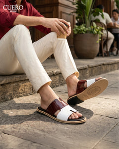 Diwan Mehrun White patent leather slides for men in minimalist luxury aesthetic