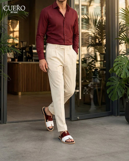 Man walking in Diwan Mehrun White minimalist patent leather slides for men