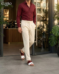 Man walking in Diwan Mehrun White minimalist patent leather slides for men