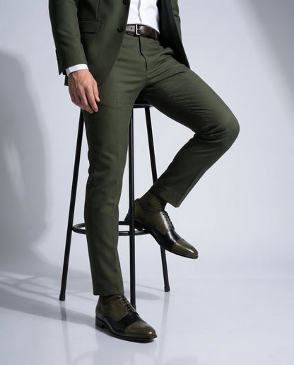 Ducaro wingtip lace-up shoes worn with tailored outfit in walking lifestyle shot showcasing luxury menswear elegance and confidence