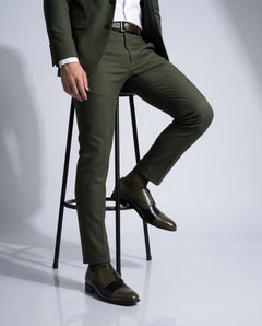Ducaro wingtip lace-up shoes worn with tailored outfit in walking lifestyle shot showcasing luxury menswear elegance and confidence