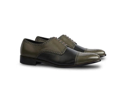 Side profile view of Ducaro wingtip lace-up shoes highlighting handcrafted leather finish and elegant formal silhouette