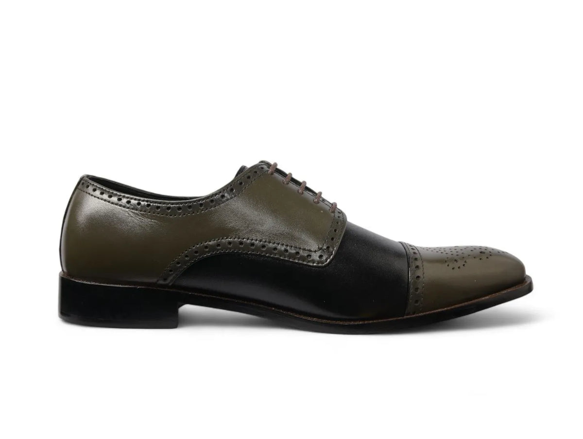 Side profile view of Ducaro wingtip lace-up shoes highlighting handcrafted leather finish