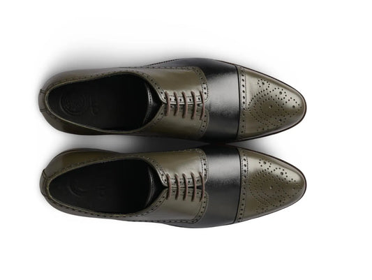 Top angled view of Ducaro wingtip lace-up shoes showing brogue perforation, lace structure, and premium leather craftsmanship