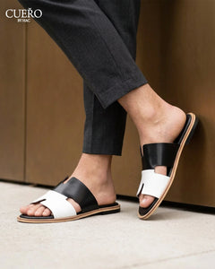 Close-up of Dujan Black White luxury leather slides with refined detailing
