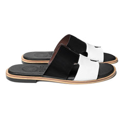 Front pair view of Dujan premium black and white leather slippers for men by Cuero by HAC