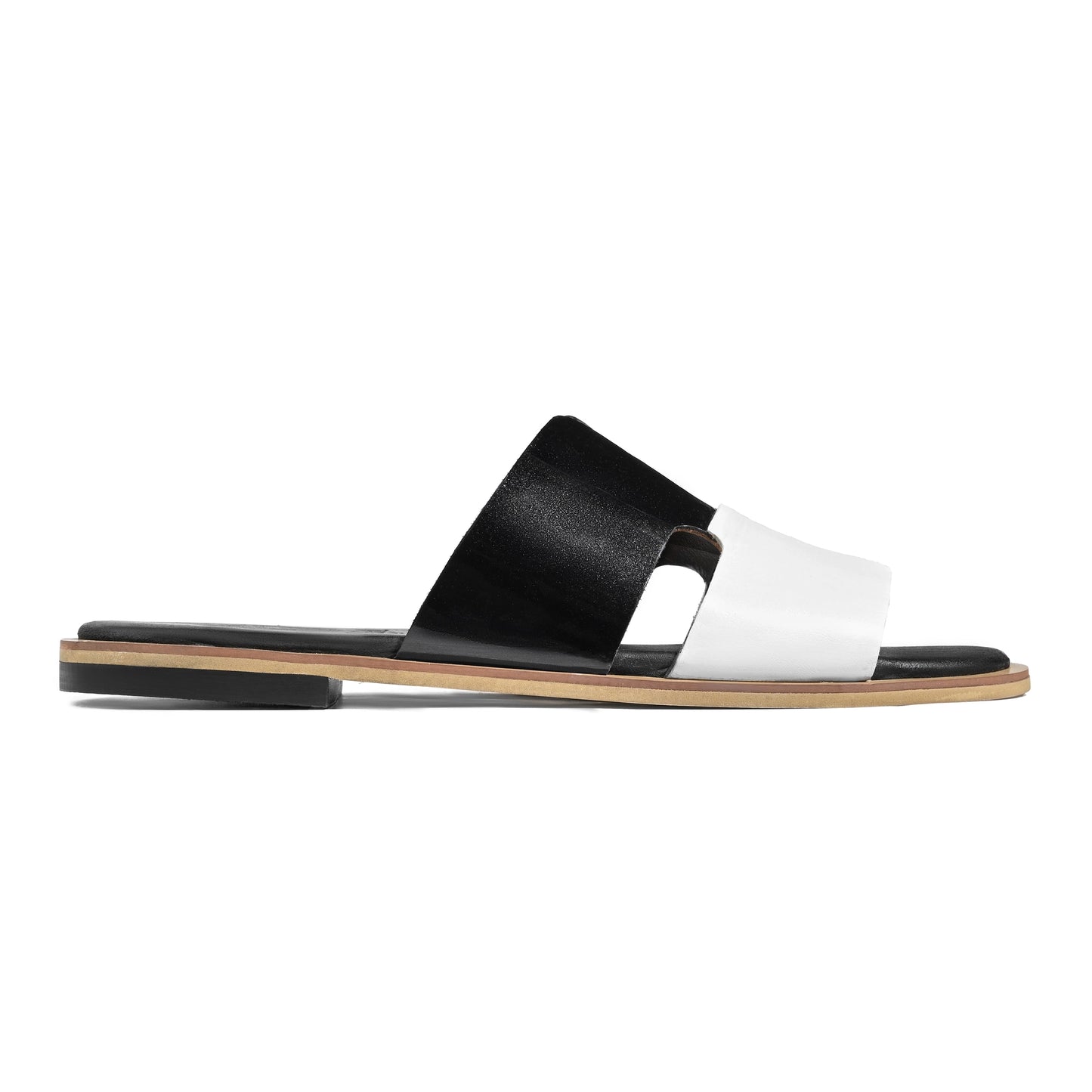 Side profile of Dujan black and white premium leather slide slippers for men