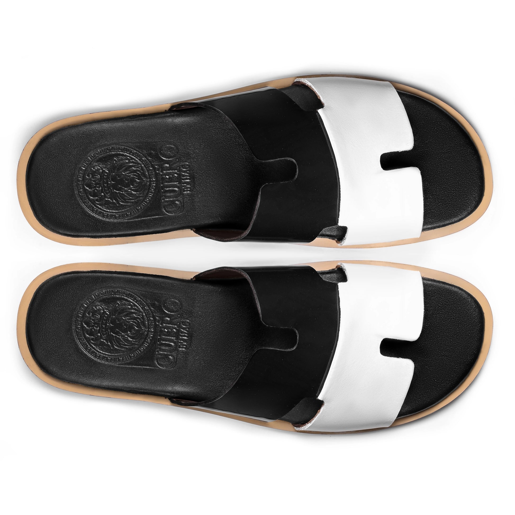 Top view of Dujan black and white leather slippers for men from the Qadam Collection by Cuero by HAC