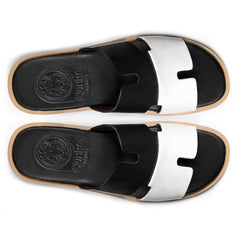 Top view of Dujan black and white leather slippers for men from the Qadam Collection by Cuero by HAC