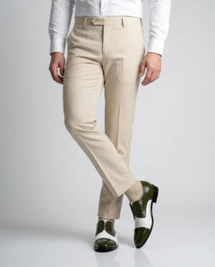 Ebony and Ivory brogue shoes styled with formal outfit in standing lifestyle shot showcasing bold menswear fashion