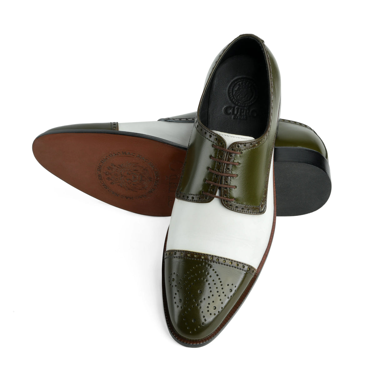 Bottom sole view of Ebony and Ivory brogue shoes showing durable outsole grip and structured construction
