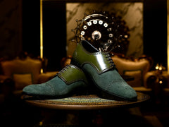 Angled view of HAC’s Plush Lace Up oxford shoes in green suede and leather showing premium detailing