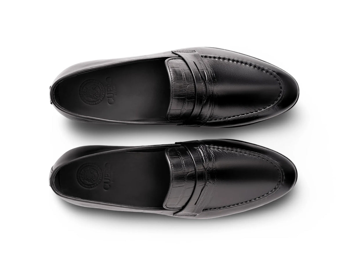 Top view of Hudson black leather loafers showing clean stitching, premium leather texture, and minimalist handcrafted design