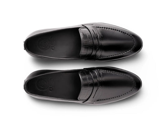 Top view of Hudson black leather loafers showing clean stitching, premium leather texture, and minimalist handcrafted design