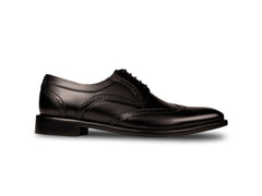 Side profile of Huxley black lace-up formal shoes highlighting sleek silhouette, polished finish, and refined menswear craftsmanship