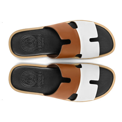 Top view of Illan mustard and white leather slippers for men showing the Qadam cutwork strap design
