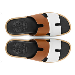 Top view of Illan mustard and white leather slippers for men showing the Qadam cutwork strap design