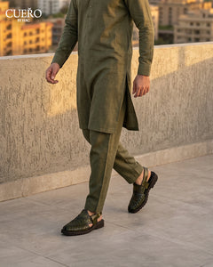 Man walking in Khyber 03 Olive Patina Weave handcrafted Peshawari chappal