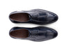 Top angled view of Leonardo Blue lace-up shoes showing lace structure, stitching detail, and elegant blue leather craftsmanship