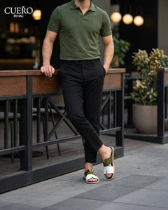 Luxury olive green and white leather slides with sleek contemporary silhouette