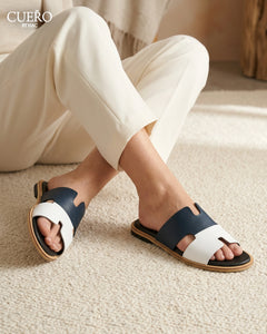 Luxury blue leather slides styled in elevated resort wear aesthetic
Minimal designer blue leather slippers for men with premium craftsmanship