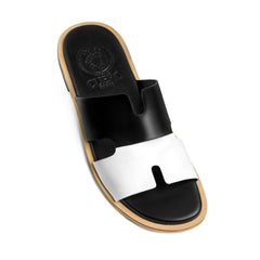 Angled view of Nishan black and white luxury leather slippers for men by Cuero by HAC