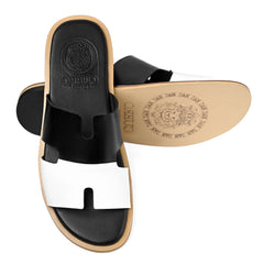 Nishan black white leather slippers showing Cuero by HAC embossed footbed and leather outsole