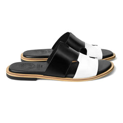 Side profile of Nishan black and white designer leather slippers for men by Cuero by HAC