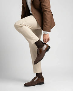 Nobelwood Lace-up suede and leather oxford shoes worn with tailored outfit in standing lifestyle shot highlighting elegance and confidence