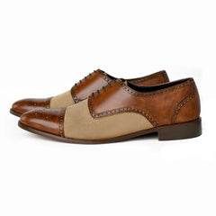 Noble Garnet Oxford two-tone suede and leather cap-toe shoes in premium studio product shot